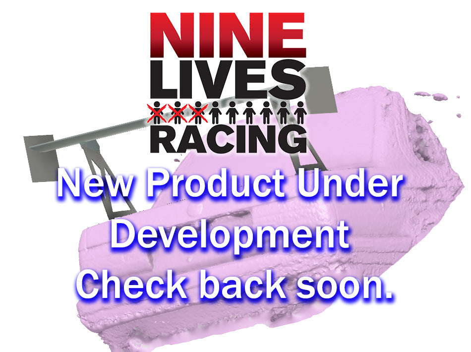 A promotional image for 9livesracing featuring a large logo at the top. Below the logo, text reads, "New Rear Wing Kit for Audi TT 2nd gen. 06-2014 Under Development. Check back soon." The background depicts an abstract, purple-tinted image of a car with a spoiler designed for optimal downforce.