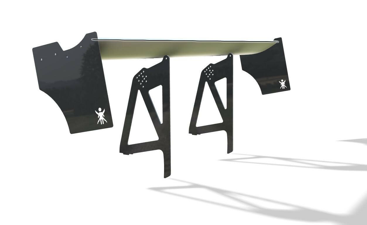 Two 3-Series Big Wang kits (â14-18 F80 / F82 / F83) by 9livesracing, complete with triangular stands and silhouette figures, are set up in an outdoor shooting range. The stands, reminiscent of extruded aluminum wings, feature both triangular and circular cutouts near the top. They are designed for target practice and cast shadows on the white background.