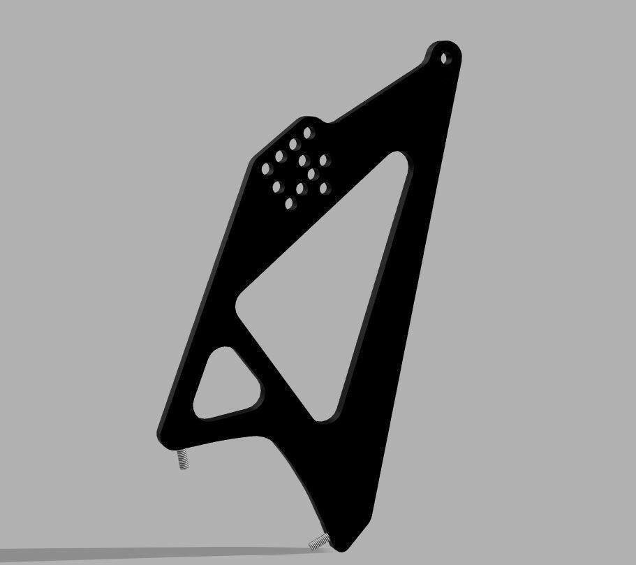 A black triangular metal bracket, designed as part of the Fc Rx7 Wing Mounts - Pylons Only kit from 9livesracing, sits upright against a gray background. This bracket features a small triangular cutout at the lower left, a larger angular cutout in the center, and a set of circular holes near the top.