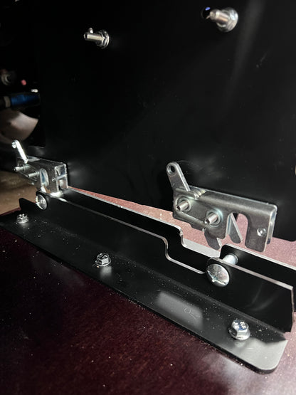 photos of the nine lives racing S197 splitter mounts installed which the quick release latches released and disconnected from the splitter.