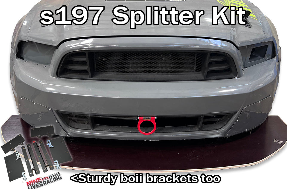 Front end of a S197 mustang  with a splitter kit installed below the bumper,.