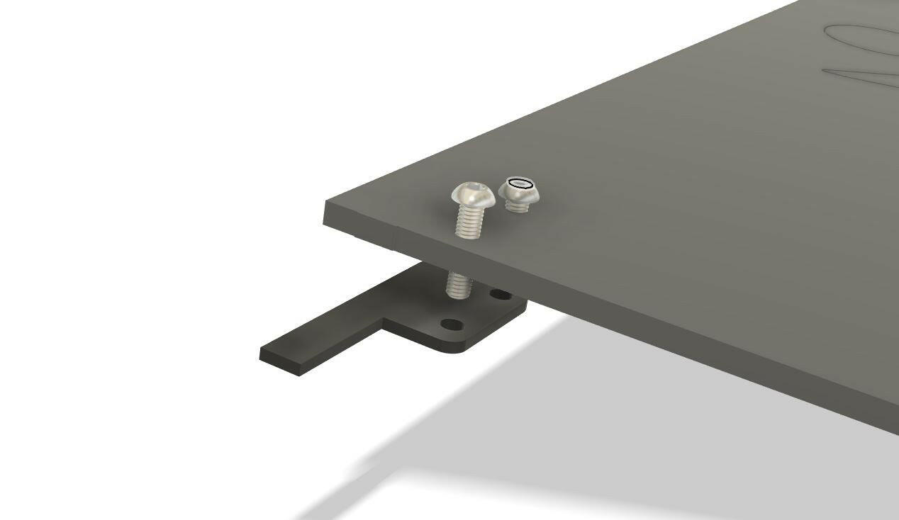 A rectangular metal bracket from the Sturdy Boii Rad Shroud Replacement Tabs by Nine Lives Racing is fastened to the side of a flat, gray surface using a screw and bolt. The screw and bolt are positioned next to each other near the edge of the surface.