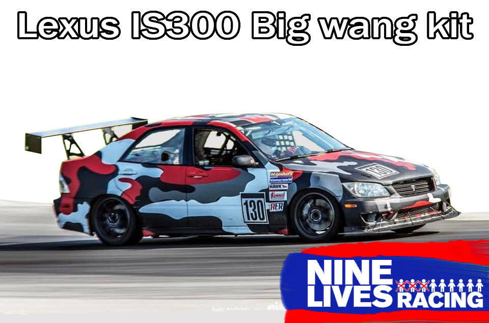 A Lexus IS300 race car, equipped with the Is300 Big Wang Kit 98-04 xe10 from 9livesracing, boasts a prominent rear wing and a camouflaged paint scheme in black, red, gray, and white. Adorned with racing decals and sporting the number 130, the text above proudly states "Lexus IS300 Big Wang GT3," emphasizing its enhanced down-force capabilities. A "9livesracing" logo is positioned at the bottom right.