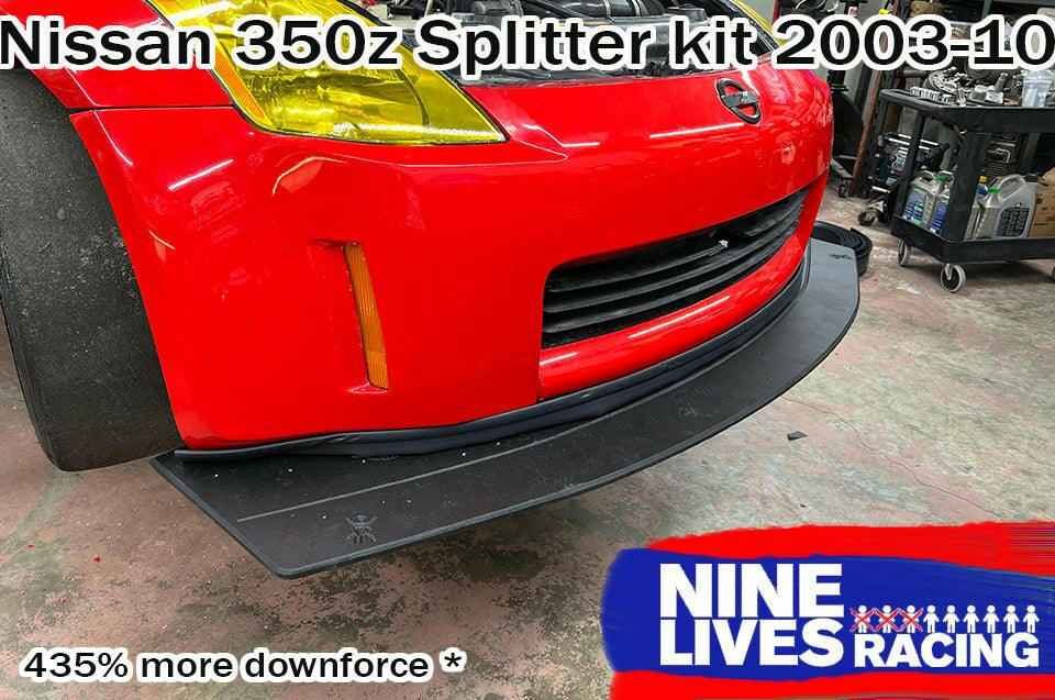 Front end of a red Nissan 350z with a 9 lives racing black splitter kit installed below the bumper.